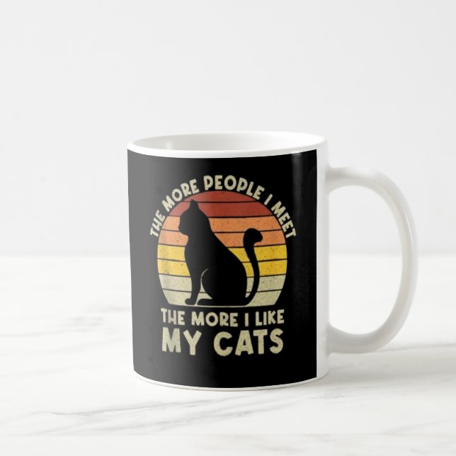 Ju fler människor jag träffar, desto mer gillar ja kaffemugg (Höger)