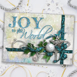 Jueled Teal och Silver Julkort<br><div class="desc">Riktigt lagrad design i djup teal och silver med satingband,  pärlor,  en silver-filigree-stjärna,  diamant nyckel,  silver ornament och holly. Texten präglas av en liten aning glitter. Bakgrunden är texturerad och nedtryckt med dubbla högdagrar. Inuti texten finns anpassade. Matchande produkter är tillgängliga.</div>