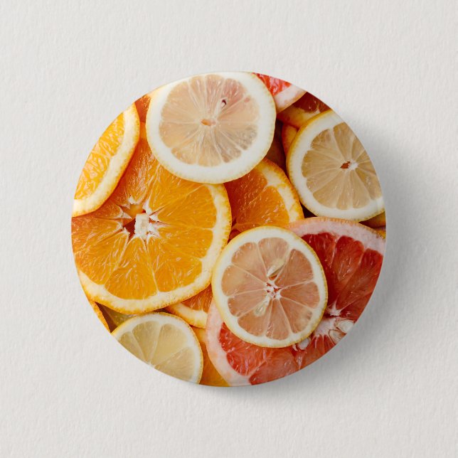 Juicy Sliced Citrus Fruits Knapp (Framsida)