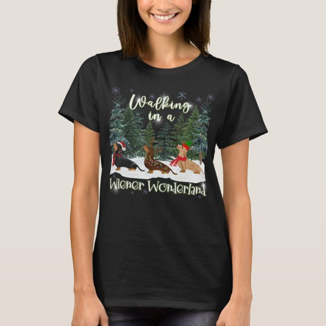 Jul Dachshund som går i ett Wiener Wonderland T Shirt (Framsida)