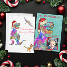 Jul-dinosaur T-Rex iklädd Santa-hatt Foto