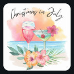 Jul i juli Tropiska Beach Sommaren Party Fyrkantigt Klistermärke<br><div class="desc">Den tropiska jultomten i juli-klistermärken eller kuvertsälar har en solnedgång med vattenfärg,  cocktails,  hibiscus-blommor och handflatan-löv med texten "Jul i juli" i handskrivet stil-brev.</div>