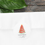 Jul i juli Watermelon Runt Klistermärke<br><div class="desc">Julen i juli i år pryds med en röd vattenmelon Julgran. Enkelt anpassade. Använda Verktyg i Design om du vill ändra texten storlekt,  stil eller färg. Eftersom vi skapar vår teckning kommer du inte att hitta just den här bilden från andra designers. Ursprunglig vattenfärg © Michele Davies.</div>
