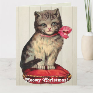 Jul Kitten Sitta, som bar ett rött strö Kort