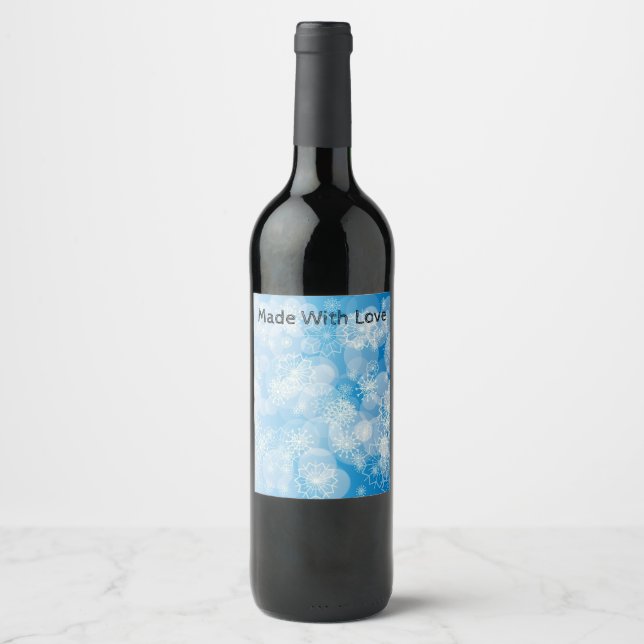 Jul snöflingor på blå bakgrund vinflaska etikett (Framsida)