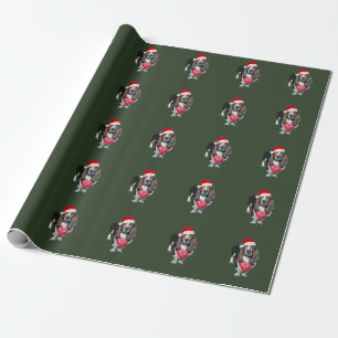 Jul som slår in papper med bassethund presentpapper