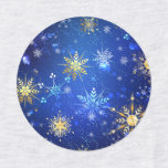 JULAFTON Blue Background med Golden Snöflingor Klistermärke<br><div class="desc">Blå julbakgrund med guld och vitt smycke snöflingor. Golden snöflingor. JULAFTON.</div>