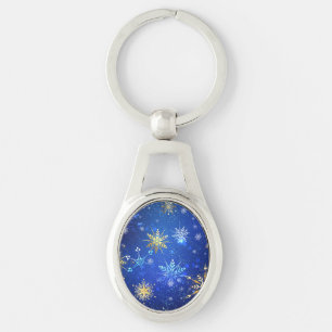 JULAFTON Blue Background med Golden Snöflingor Ovalt Silverfärgad Nyckelring
