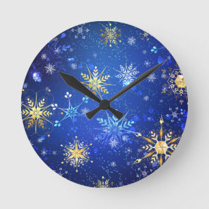 JULAFTON Blue Background med Golden Snöflingor Rund Klocka