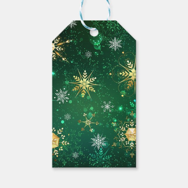 Julafton Golden Snöflingor på Grönten - bakgrunden Presentetikett (Framsidan)