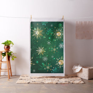 Julafton Golden Snöflingor på Grönten - bakgrunden Tyg