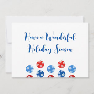 Julblått och rödprydnadsföremål med snöflingor julkort