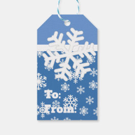 Julblått och vitt snöflingor presentetikett