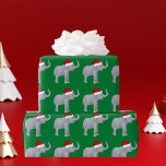 Julelefant i Santa Hat-Grönten Presentpapper<br><div class="desc">Den sötterna elefantens pappra julomslutning av en  elefant som bär en röd julhatt på gröntens bakgrund. Jag kärlek lustiga helgdag.</div>