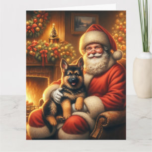 Julen Santa och den tyska shepherd Puppy Kort