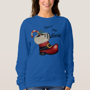 Julen som är dålig, stoppa inte Believin. T Shirt