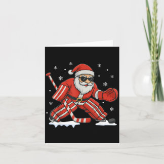 Julen Tomte spelar ishockeymålvakt jul Kort