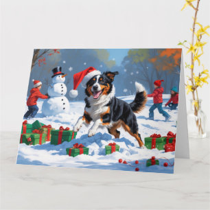 Julfestlig snöscen med australisk kelpie kort