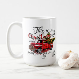 Julfilmen land lastbil tittar på kaffemugg