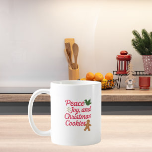 Julfreds-cookies citerar rött kaffemugg