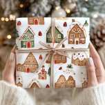 Julgingerbröd Hushåll Pappra Presentpapper<br><div class="desc">Backa dina helgdag med den festliga charmen från julbrödhuset som är pappert och som har en mysigt vinterscen i snö i klassiskt rött och grönt färg. Den här pappra inslagningen är försedd med charmerande brödhus och sprinklad med snöflingor och ger presenter ett varmt och nostalgiskt helgdag. Perfekt för julmöten, julfester...</div>