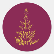 Julgran i burgunder och guld