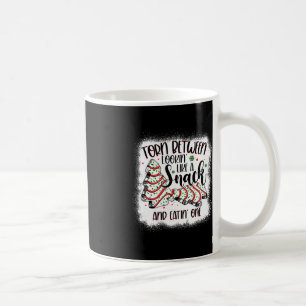 Julgran-kummelns mellan kloaken som en sna kaffemugg