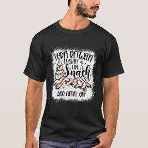 Julgran-kummelns mellan kloaken som en sna t shirt