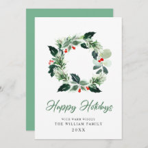 Julgran med bär krans julhälsning