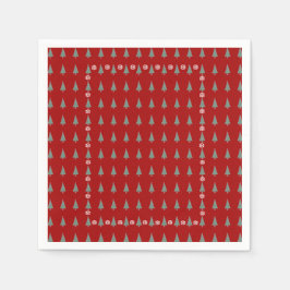 Julgran med dekoration rödbögar klockor pappersservett