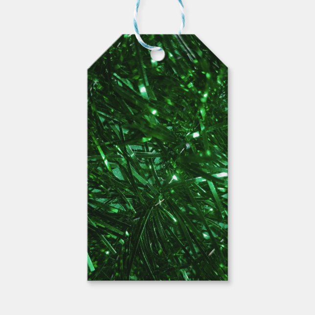 julgran tinsel med stor grönt presentetikett (Framsidan)