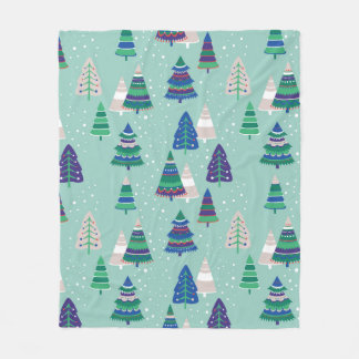 Julgranar i blå bakgrund fleecefilt