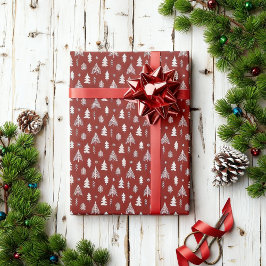 Julgranar i rött och vitt presentpapper