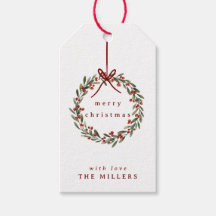 Julgranens krans med rött båge på vitt