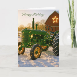 Julgrön traktor på snöig gård kort