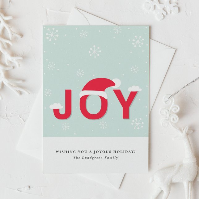 Julhälsningar Mint Snö Joy-kort Helgkort (This holiday card design showcases the word “JOY” in lettering, playfully topped with a Santa hat.)