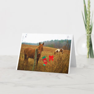 Julhäst med båge och strumpor helgkort