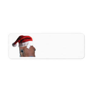 Julhäst som ha på sig en jultomtenhatt returadress etikett