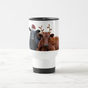 Julhelgdagkor i den Santa hatten och horn på Resemugg
