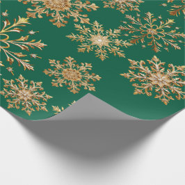 Julig guld- och grön snöflinga presentpapper