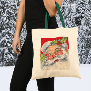 Julig jul, glädjefull jultomte med sin mössa tygkasse