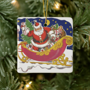 Julig jultomte med släde julgransprydnad keramik