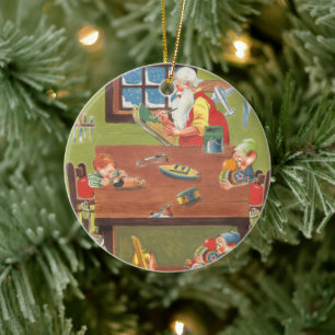 Julig jultomte med tomtar i verkstaden julgransprydnad keramik