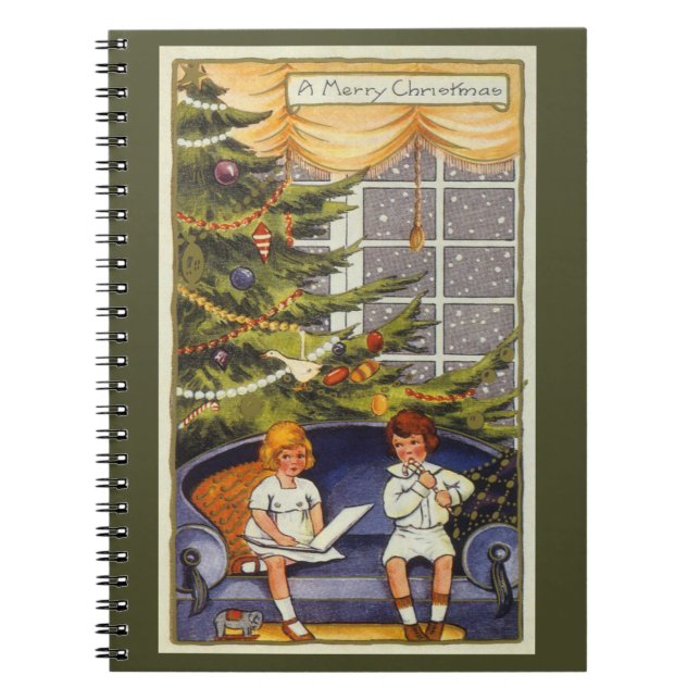 Juligt jul, barn sitter på en soffa anteckningsbok (Framsidan)