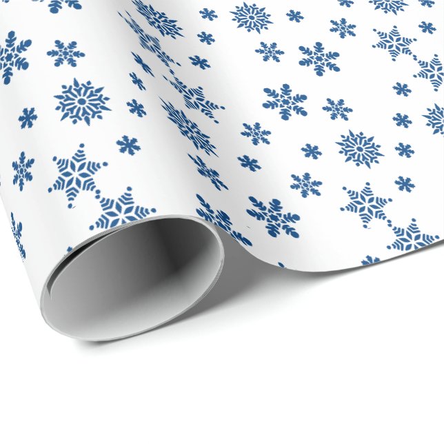 Juligt presentpapper med blå snöflingor till jul (Rullad Hörn)