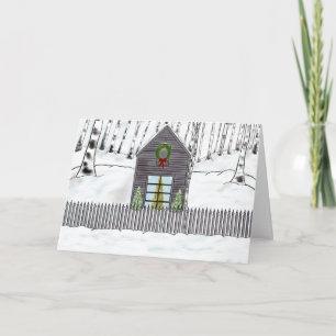 Julkabin i det snöig skogenhelgdagkortet kort