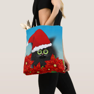 Julkatt i Santa Hat Amid Poinsettia Tygkasse