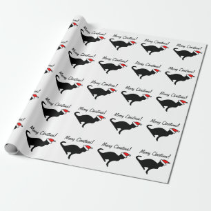 Julkatt som slår in papper presentpapper