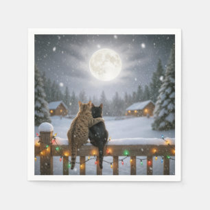 Julkatten kramas på ett snöigt staket pappersservett