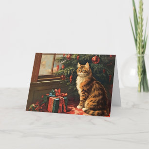 Julkitty vid fönstret helgkort